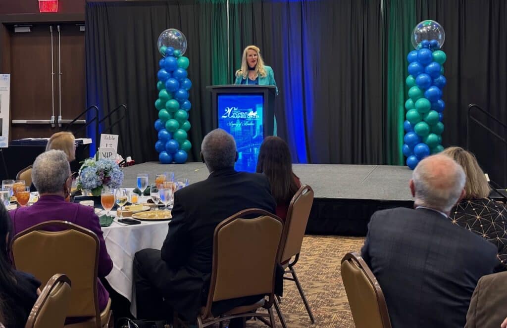 Snowden McFall addresses the audience at the 20th anniversary of the JWBC